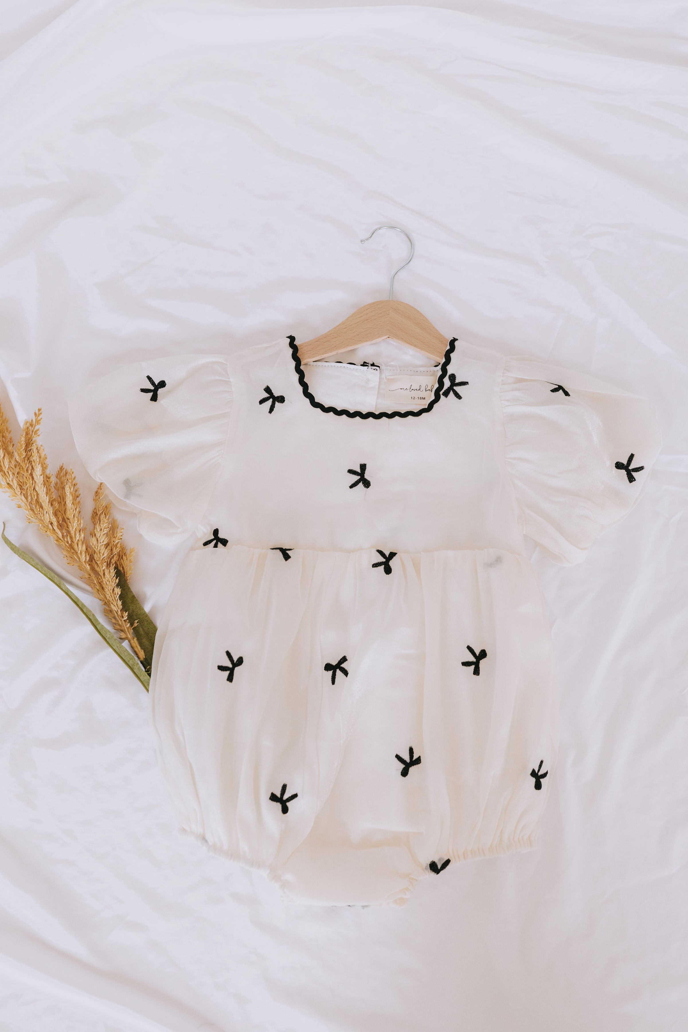 Pretty Things Baby Bodysuit